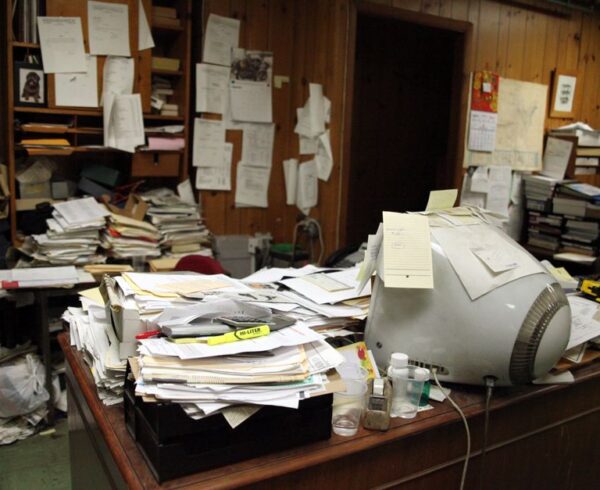 Very messy desk in cabin office